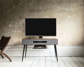 A multi-functional TV stand by Ruark Audio, pictured here in a contemporary setting