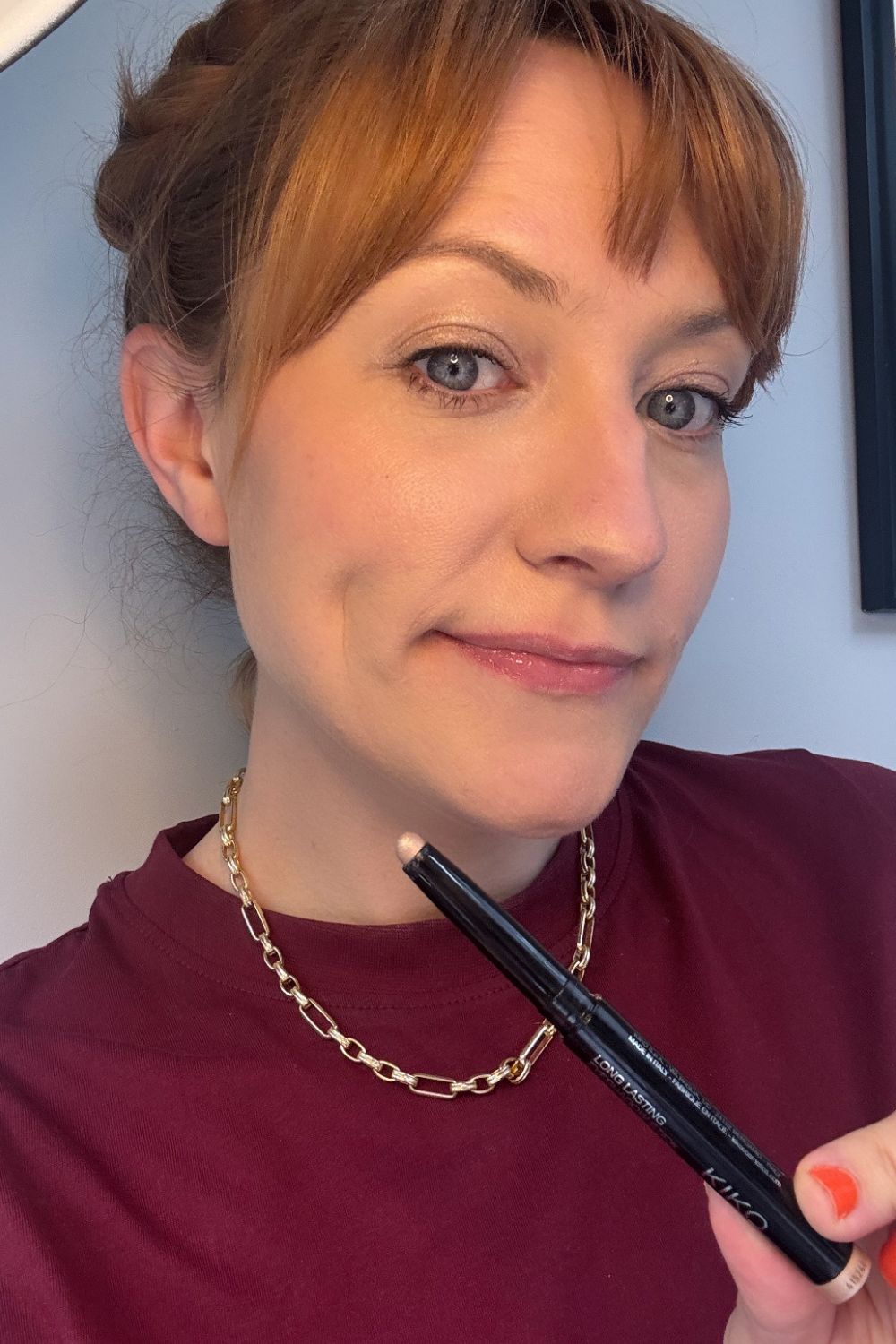 a headshot of matilda with kiko milano eyeshadow stick