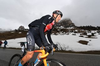 Damiano Caruso of Bahrain Victorious in breakaway passing through Passo Giau