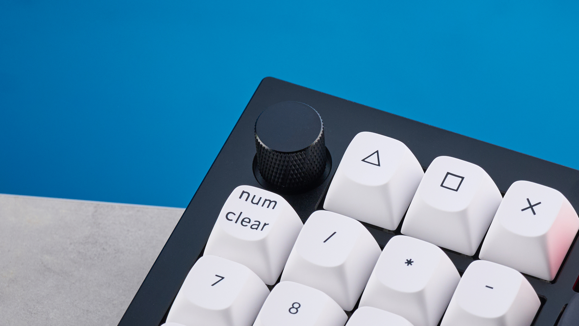 A black, white and red Keychron Q12 HE gaming keyboard with Hall Effect switches