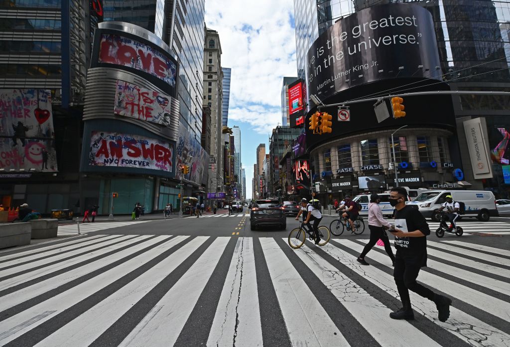 People cross the street near Time Square on September 28, 2020 in New York City. - Coronavirus infection rates have increased at &amp;quot;an alarming rate&amp;quot; in several New York neighbourhoods, particu