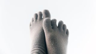 Isolated feet in finger socks