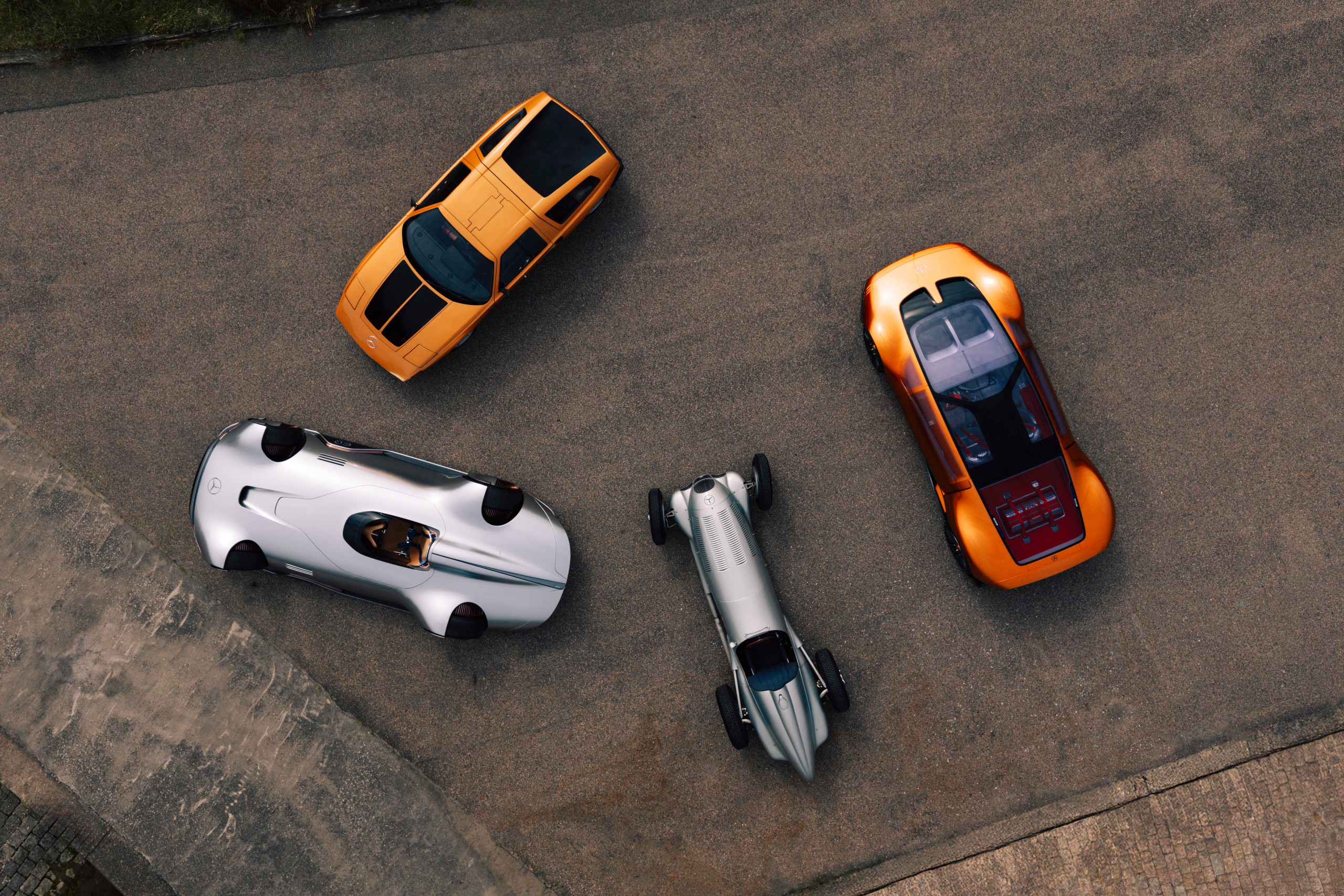 A cluster of classic Mercedes (from top left): Mercedes-Benz C 111-II, Mercedes-Benz Vision One-Eleven, Mercedes-Benz W 125 and Mercedes-Benz Vision EQ Silver Arrow