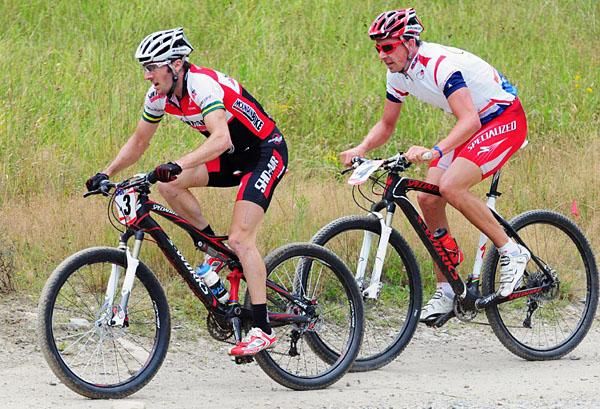 Sid Taberlay (ShoAir/Specialized) and Todd Wells (Specialized) traversing the ski slope.