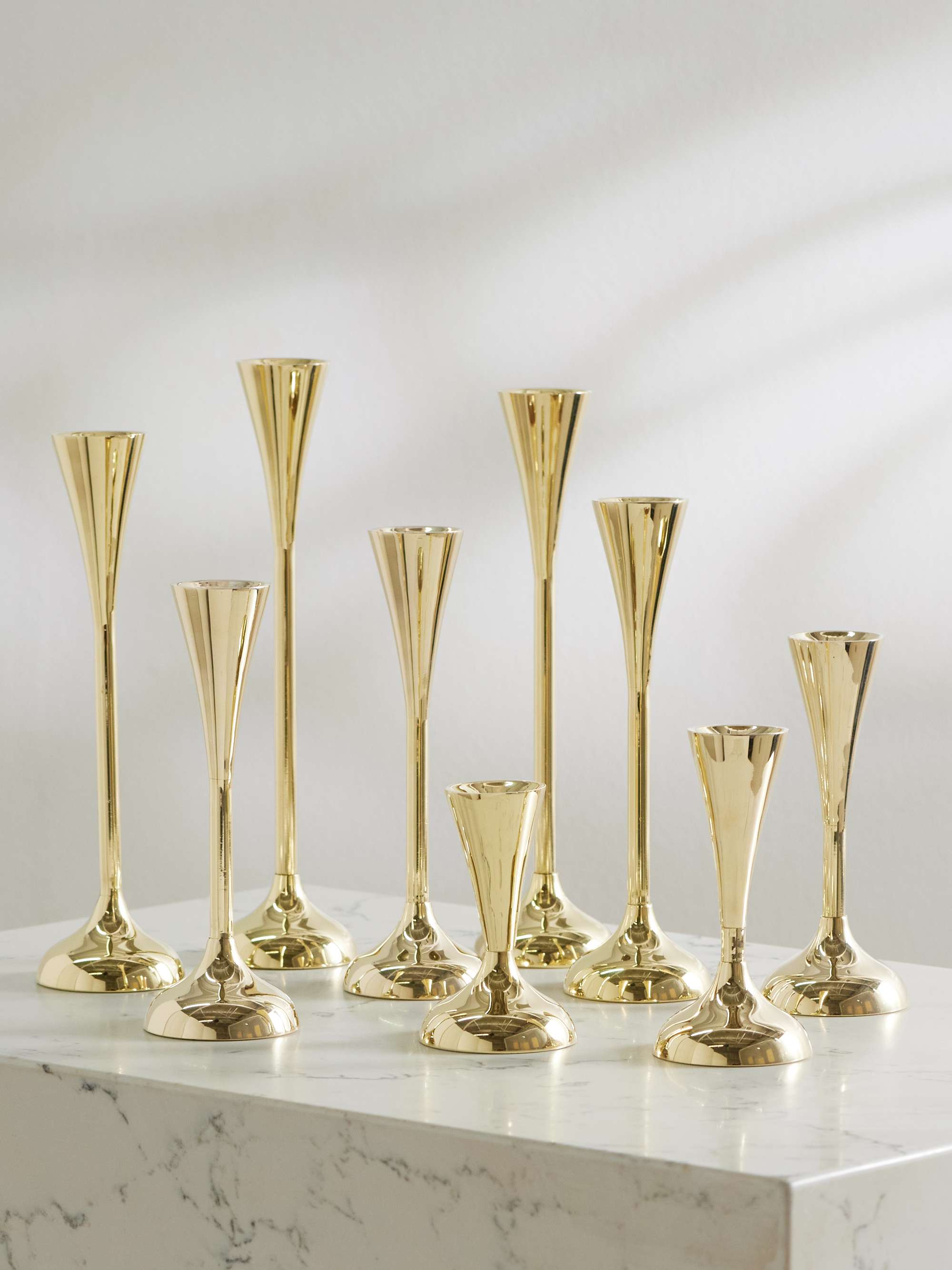 Drip Set of Nine Gold-Tone Candleholders