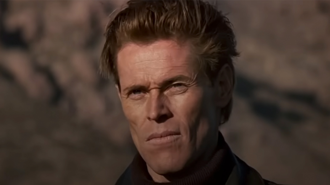 A close of Willem Dafoe looking cool