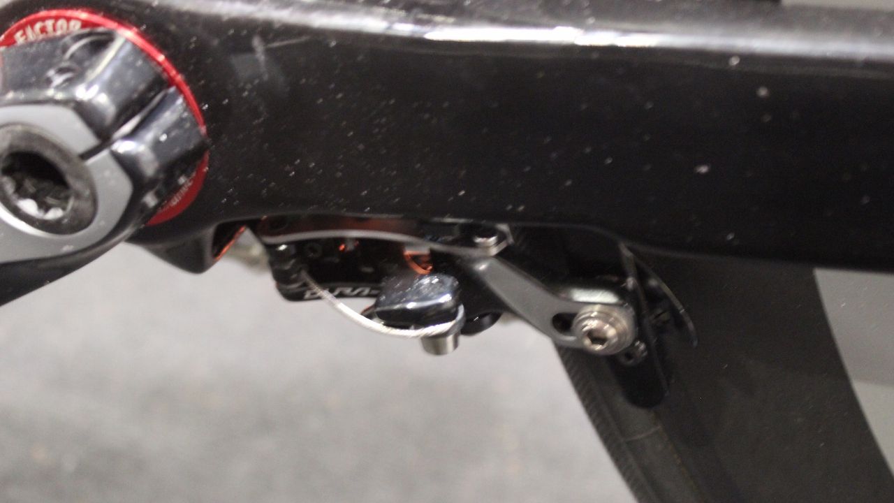 The rear brake is positioned underneath the bottom bracket to stay out of the wind
