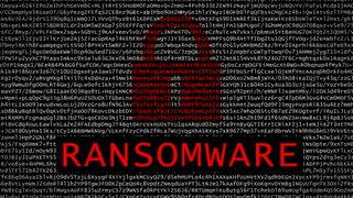 Abstract image of a padlock above a large ransomware sign to symbolise cyber security