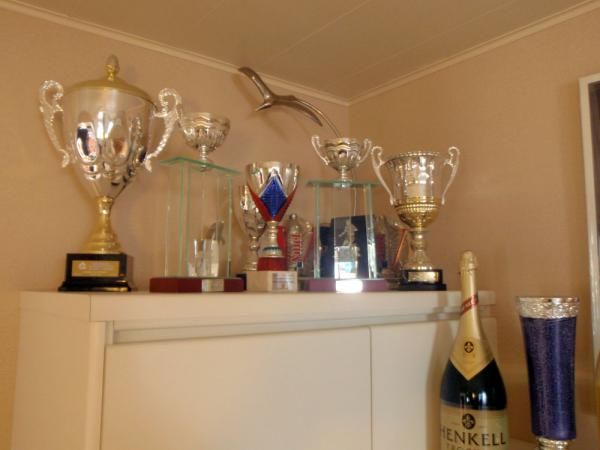 Riders normally keep the trophies they've earnt, but the ones that get left on the team bus usually end up here.