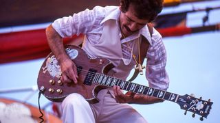 Carlos Santana performs at the Oakland Stadium on July 2, 1977 in Oakland, California.