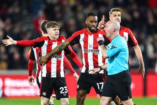 Keane Lewis-Potter and Ivan Toney of Brentford argues with referee Simon Hooper during the Premier League match between Brentford FC and Manchester United at Gtech Community Stadium on March 30, 2024 in Brentford, England.(Photo by Charlotte Wilson/Offside/Offside via Getty Images)