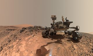 The Curiosity rover working in Gale Crater on Mars. One major goal of NASA's Mars program is to look for habitable environments in the past and present.