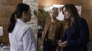 Kelli Giddish as Amanda Rollins and Mariska Hargitay as Capt. Olivia Benson talking to a doctor in Law & Order: SVU season 26 episode 3