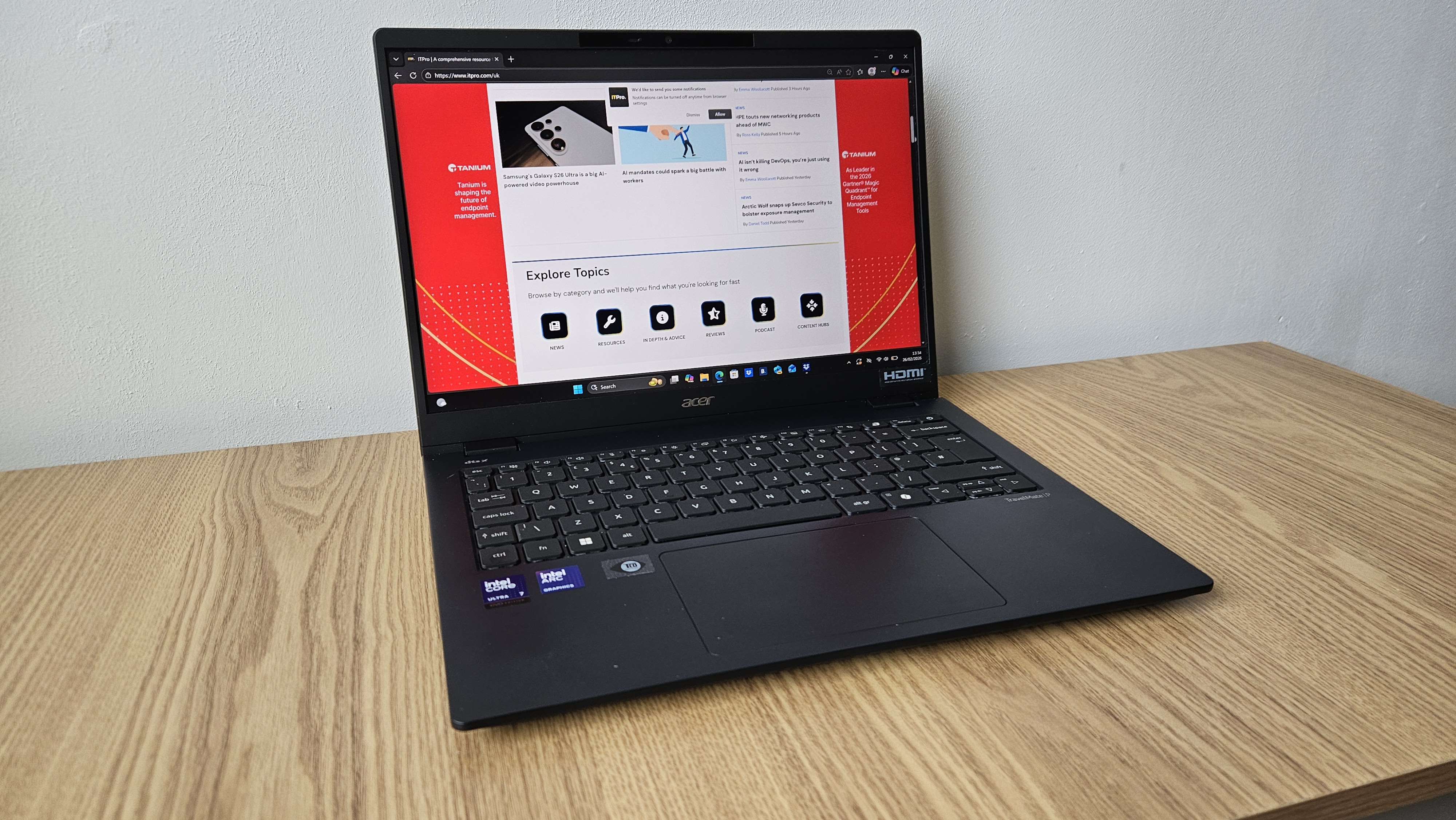 The Acer TravelMate P6 14 AI on a desk