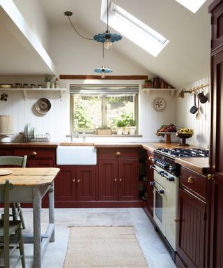 Cottage kitchen with red Shaker-style units