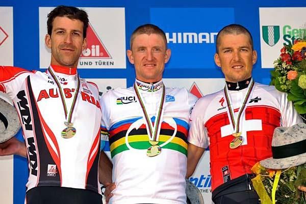 Elite men's podium with Alban Lakata - 2nd, Roel Paulissen - 1st, Christoph Sauser - 3rd