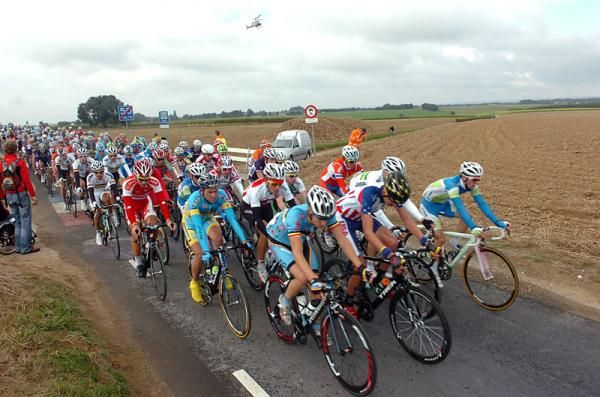 The peloton doesn't seem concerned about the early three-rider break up the road.