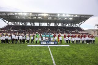 AEL Athlitiki Enosi Larissa Football Club and FC PAOK Thessaloniki players line up ahead of a 1-1 draw in the Greek Super League in 2019.