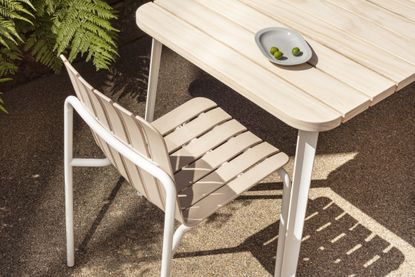 Sustainable outdoor furniture by Very Good and Proper including a chair with recycled and hemp fiber seat and Accoya wood table top