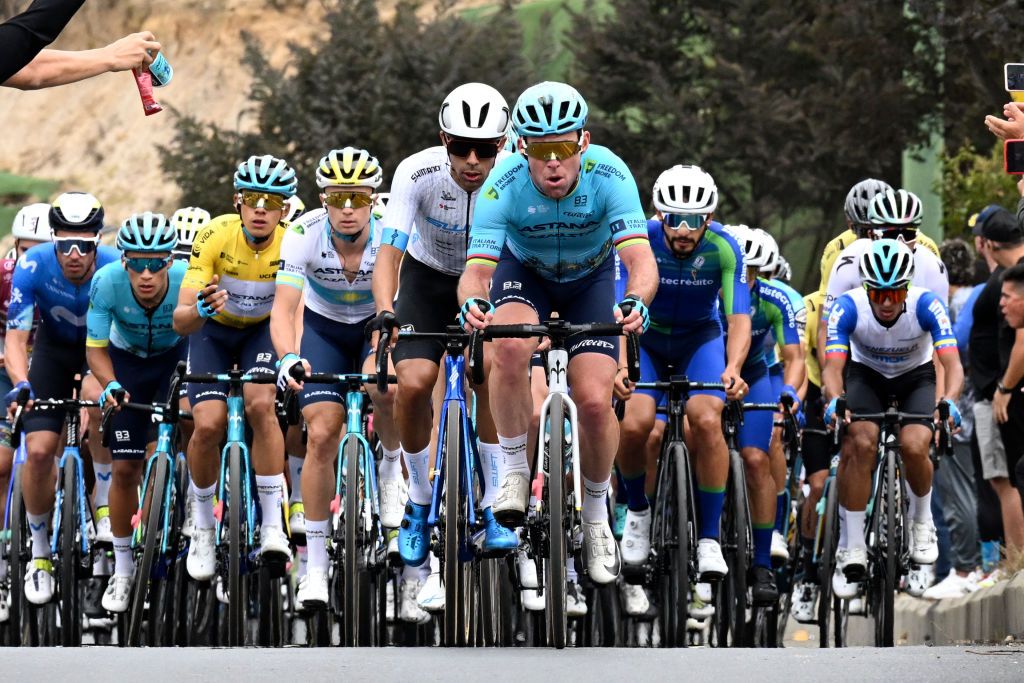 Great Britain's cyclist Mark Cavendish (C) of the Astana Qazaqstan team competes during the third stage of the Tour Colombia UCI 2024 in Tunja, Colombia, on February 8, 2024. (Photo by Luis ACOSTA / AFP)