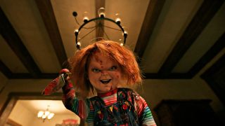 Chucky with a knife stabbing