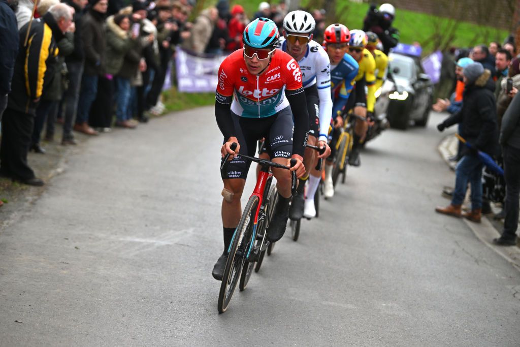 NINOVE BELGIUM FEBRUARY 24 LR Arnaud De Lie of Belgium and Team Lotto Dstny and Christophe Laporte of France and Team Visma Lease A Bike compete in the breakaway during the 79th Omloop Het Nieuwsblad 2024 Mens Elite a 2022km one day race from Ghent to Ninove UCIWT on February 24 2024 in Ninove Belgium Photo by Luc ClaessenGetty Images