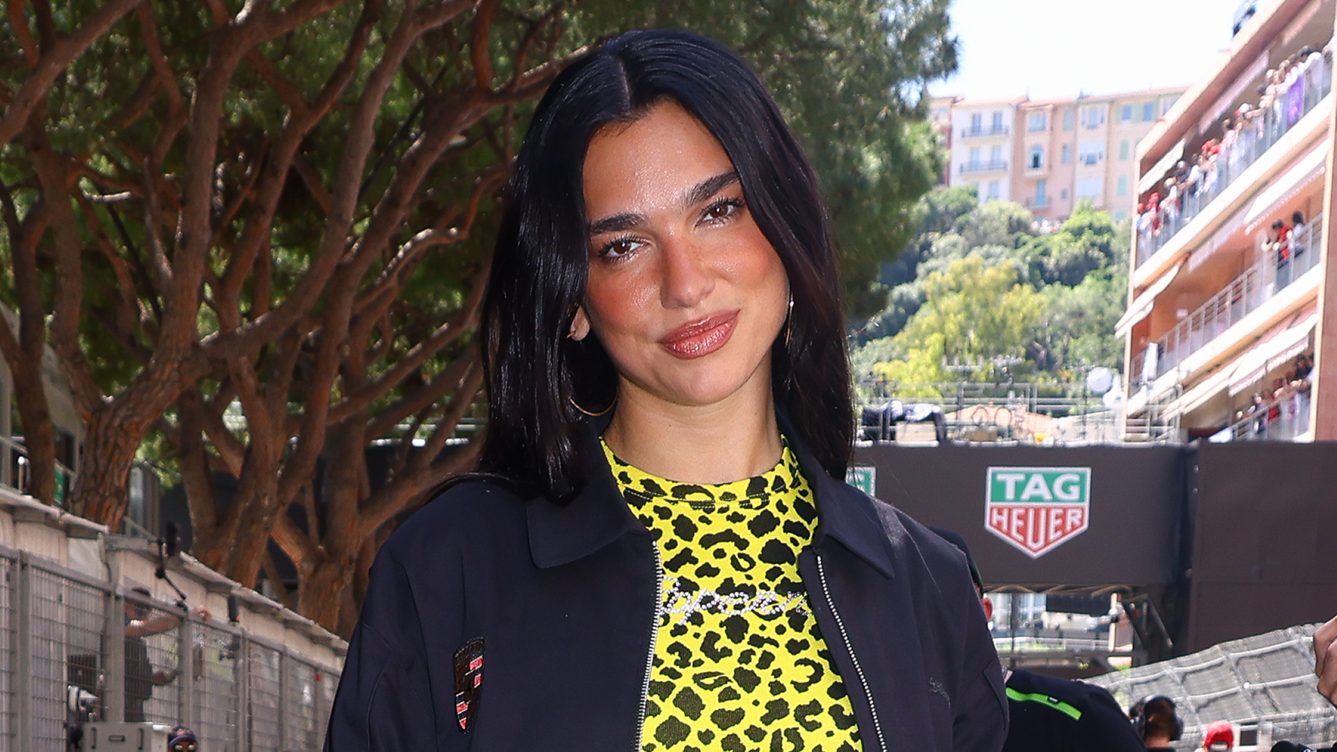 Dua Lipa visited Hyde Park in jean shorts, chunky ankle boots, and the Chanel 25 bag.