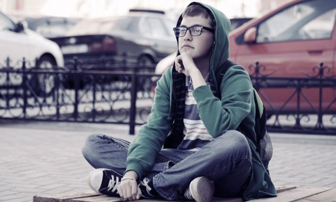 Kid sitting on bench