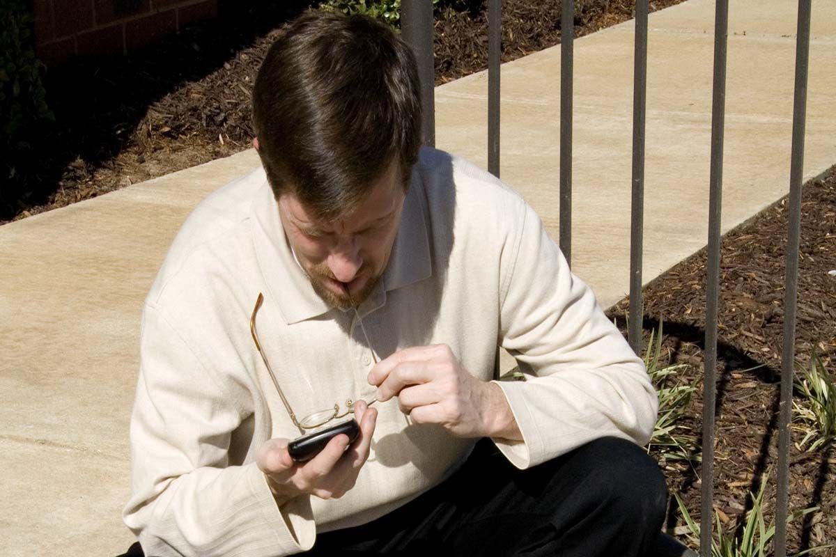 Businessman with BlackBerry in hand