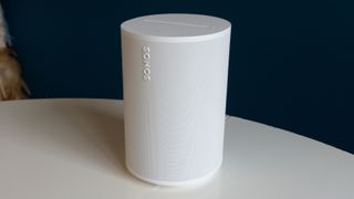 The Sonos Era 100 in white resting on a white table