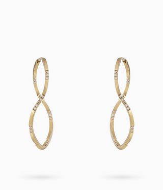 Gold and diamond hoops which twist over