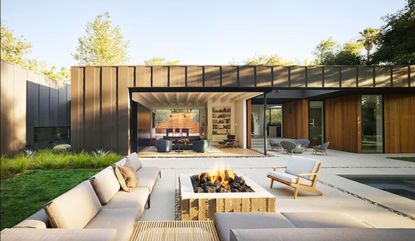 Modern patio with fire pit and outdoor sofas