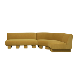 curved mustard yellow sofa with wooden legs