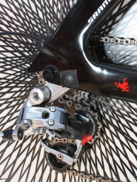 A small square of tape also covers up the rear derailleur hanger mounting bolt.