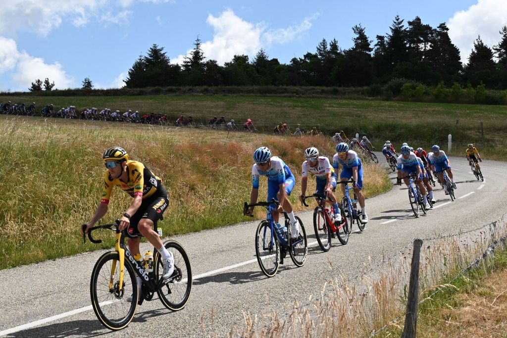 JumboVisma teams Australian rider Chris Harper L and the pack ride during the first stage of the 74th edition of the Criterium du Dauphine cycling race 192 km between La VoultesurRhone and Beauchastel on June 5 2022 Photo by Marco BERTORELLO AFP Photo by MARCO BERTORELLOAFP via Getty Images