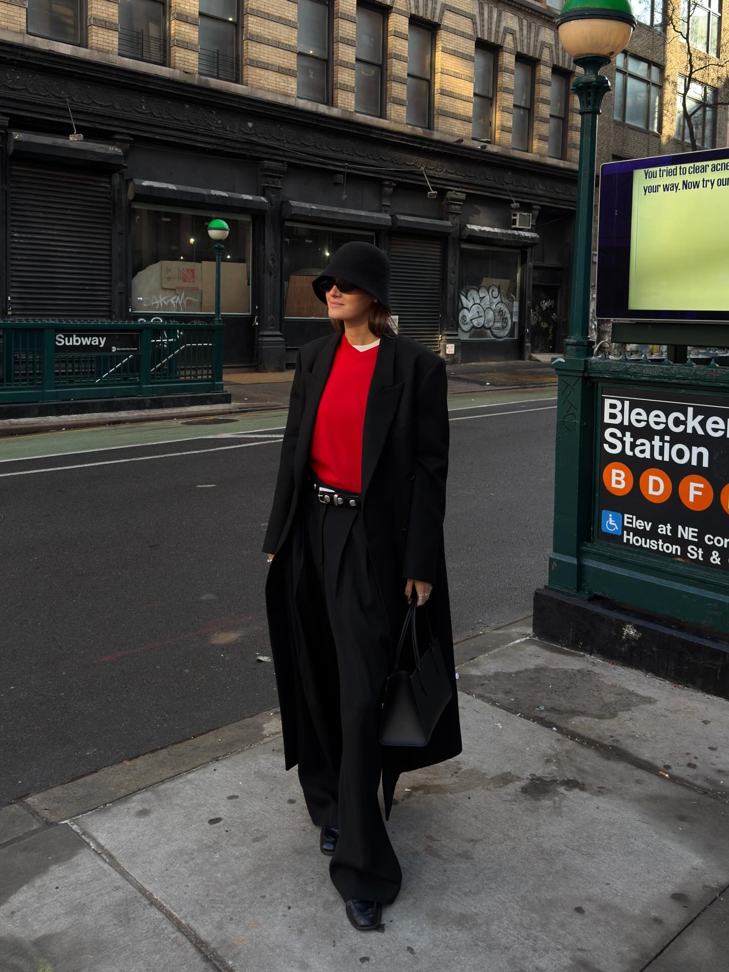 Influencer wearing black wool hat.