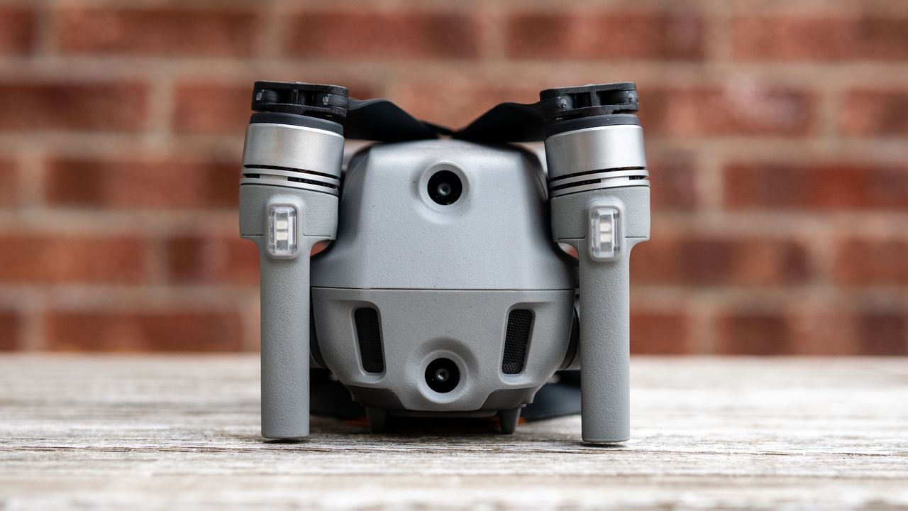 The back of the DJI Air 2S drone resting on a wooden table