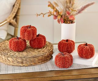 6 Sweater Weather Chenille Knit Pumpkins on a table