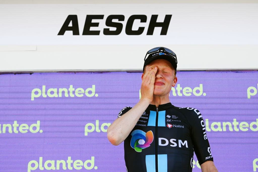 AESCH SWITZERLAND JUNE 13 Andreas Leknessund of Norway and Team DSM celebrates winning the stage on the podium ceremony after the 85th Tour de Suisse 2022 Stage 2 a 198km stage from Kusnacht to Aesch ourdesuisse2022 WorldTour on June 13 2022 in Aesch Switzerland Photo by Tim de WaeleGetty Images