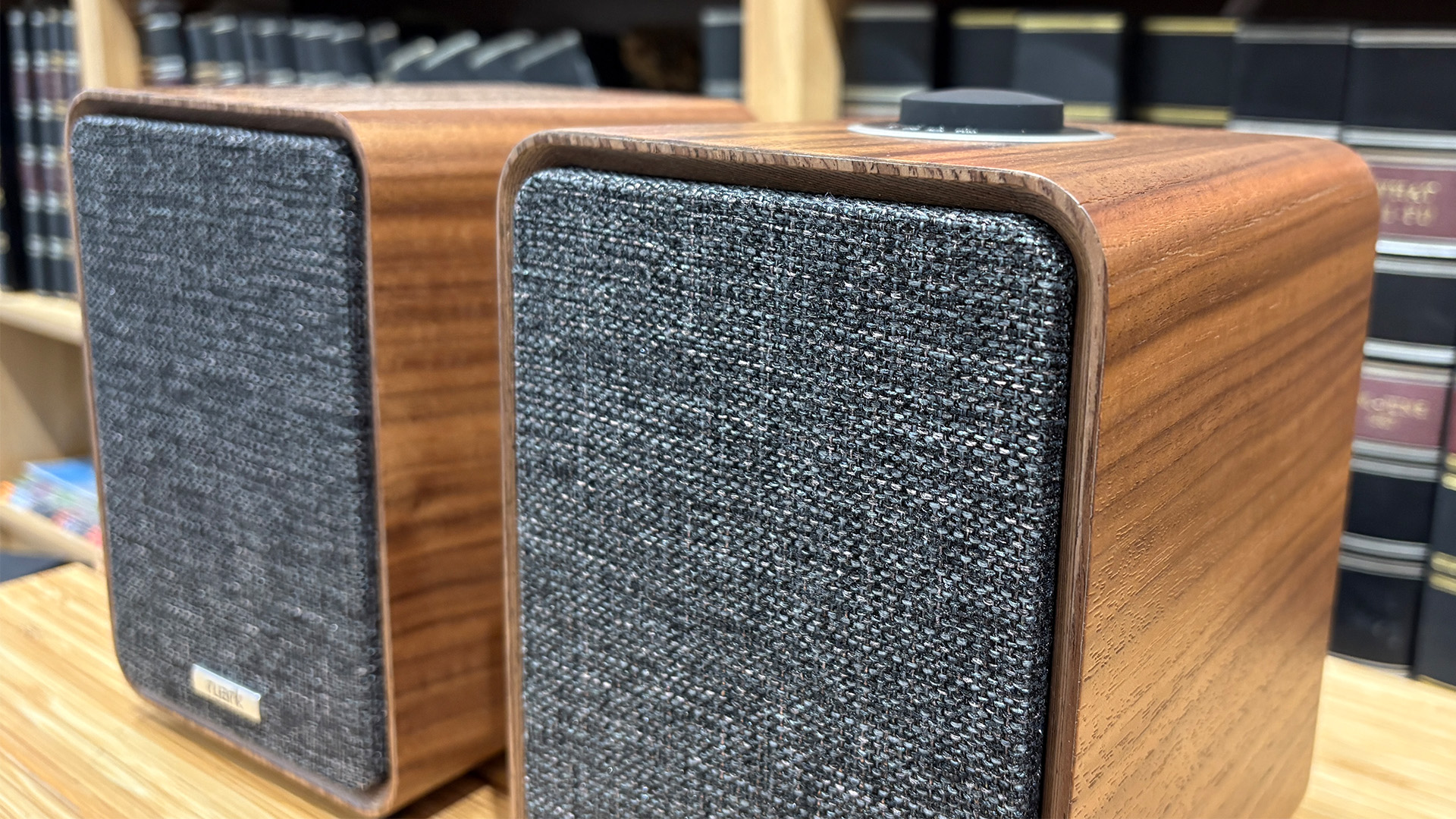 Ruark MR1 Mk3 active speakers in front of bookcase
