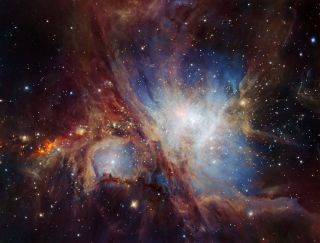 A glittering, multicolored nebula studded with new stars