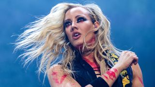 Nita Strauss of Alice Cooper's band performs on stage at The OVO Hydro on May 28, 2022 in Glasgow, Scotland.