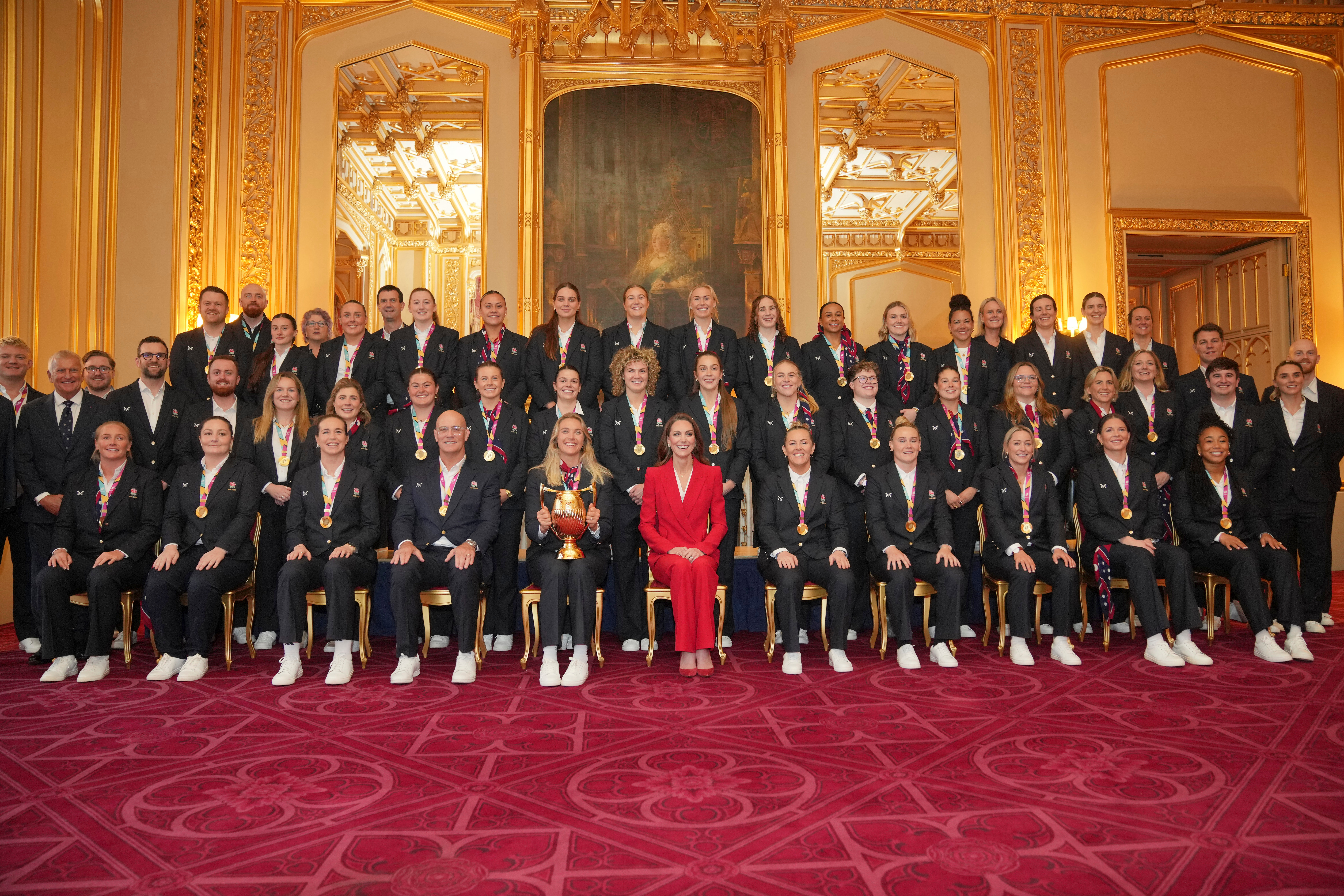 Kate, Princess of Wales, poses with members of the England Women's rugby team, at Windsor Castle, Windsor, England, Thursday, Jan. 15, 2026, the team won the 2025 Women's Rugby World Cup.