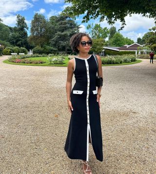 Woman wearing a black-and-white maxi dress.