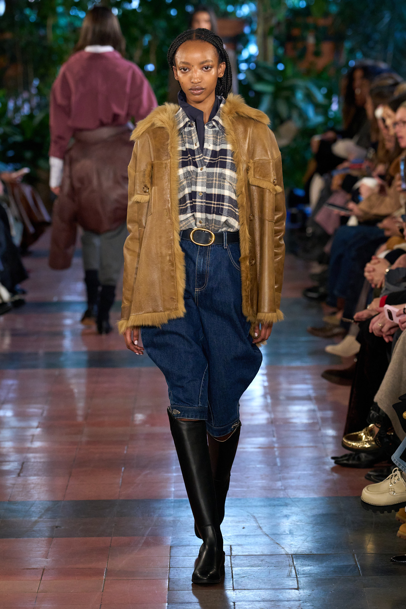 Model walking in TWP Fall Winter 2025 show.