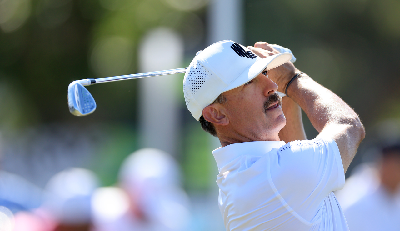 Wade Ormsby watches his wedge shot into the green