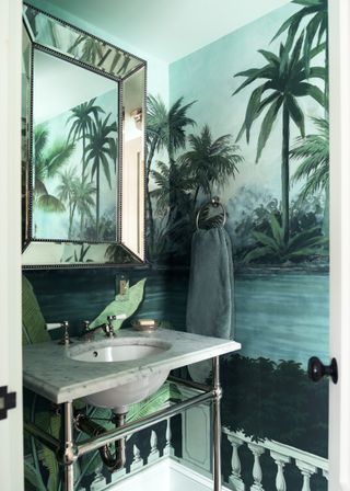 Bathroom with palm print wallpaper