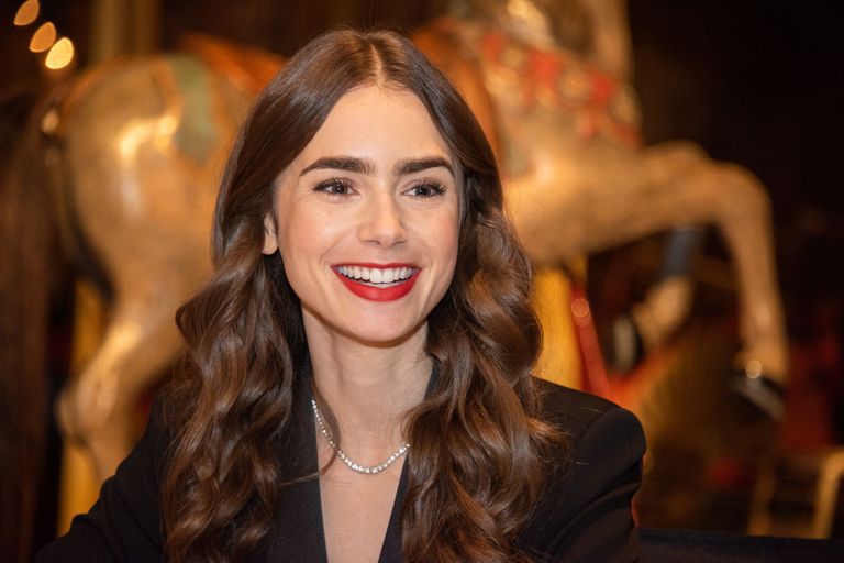 Lily Collins at the "Emily In Paris" Set Visit at Museo Des Arts Foraine on September 27, 2019 in Paris, France