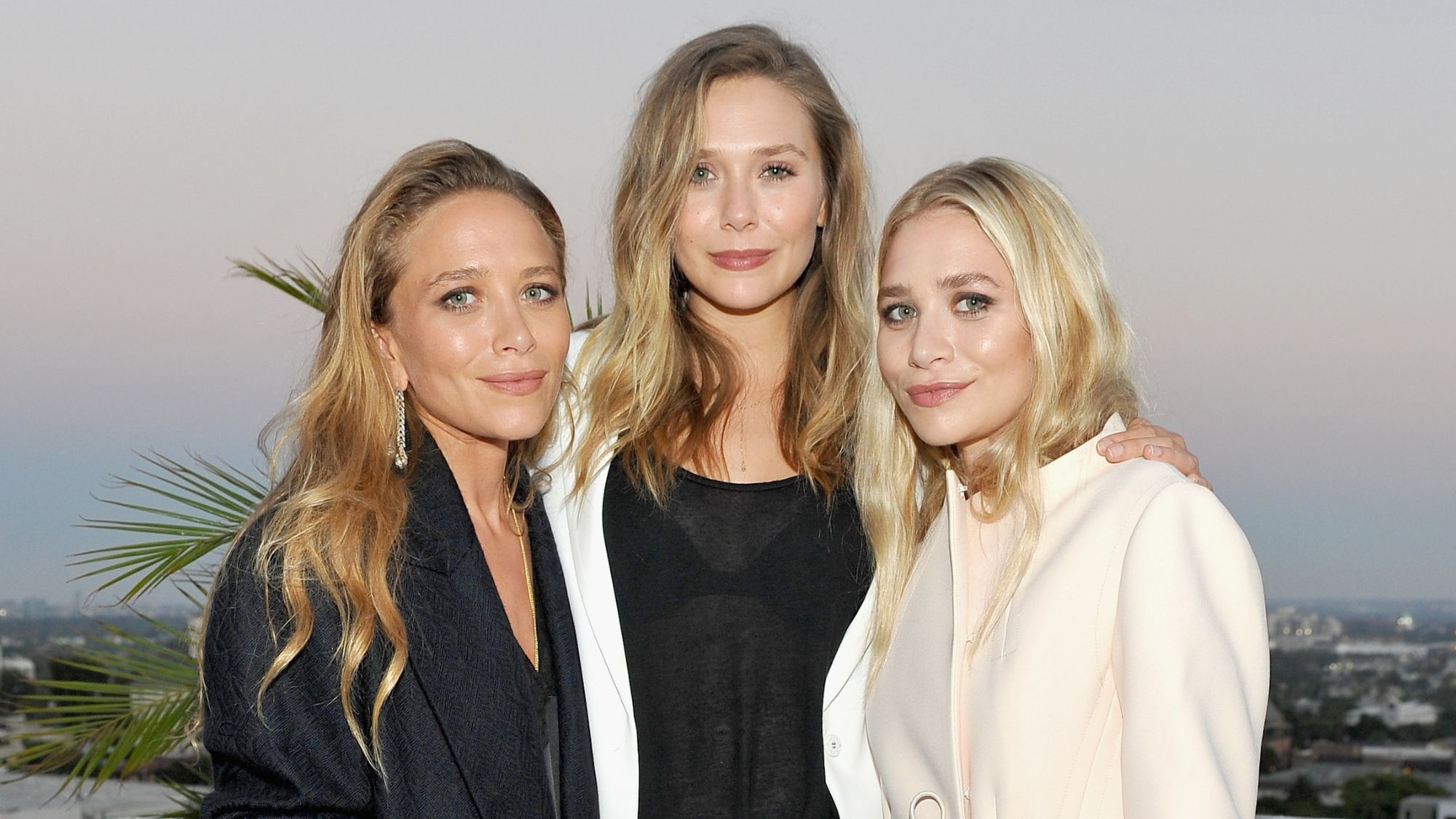 Mary-Kate, Ashley and Elizabeth Olsen attend the opening of the Elizabeth and James Flagship Store