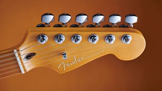 Closeups of a Fender headstock with locking tuners